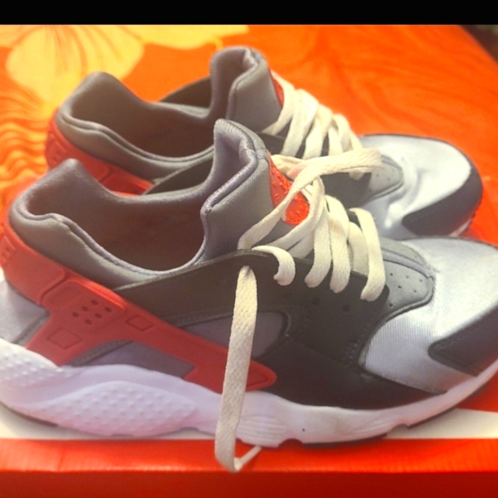 Nike hurache chrome gray,silver, and red sneakers.